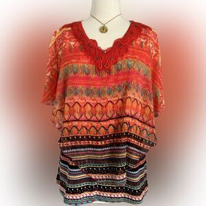 Gorgeous! Multiples vibrant colored top!